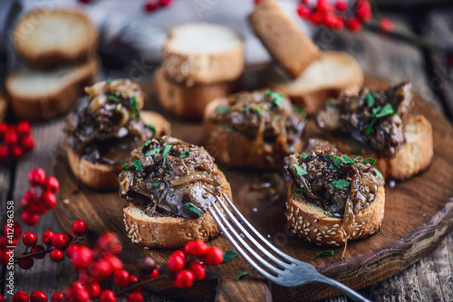 Photos Rabbit liver crostini appetizer.style rustic