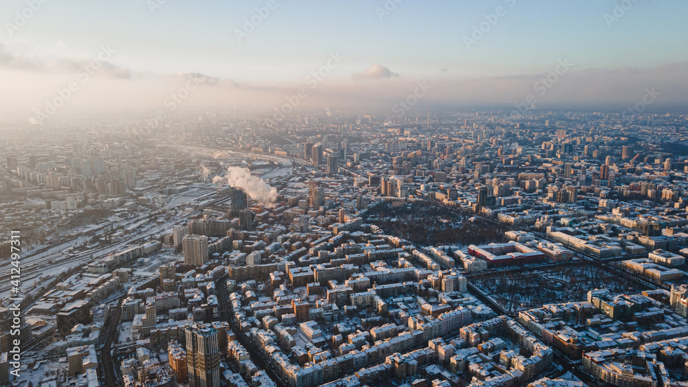 Panoramic aerial view of winter city Kyiv covered in snow Panoramic aerial view of winter city Kyiv covered in snow
