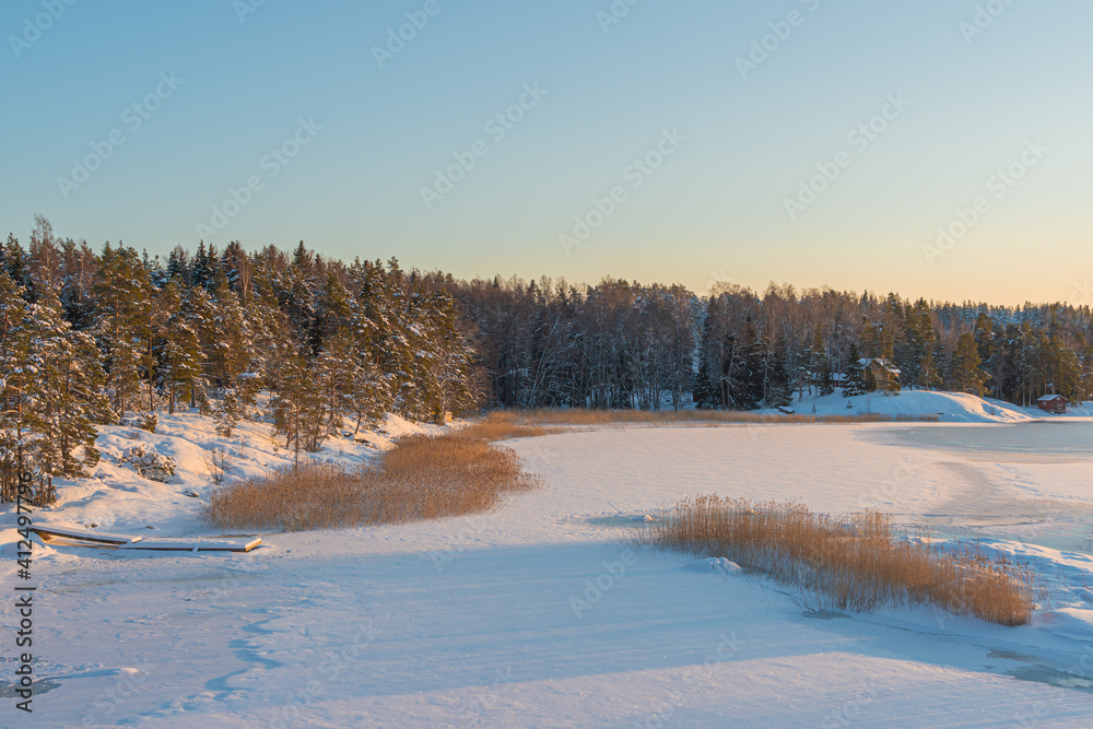 Winter seascape, frozen sea and island coast. Winter seascape, frozen sea and island coast.