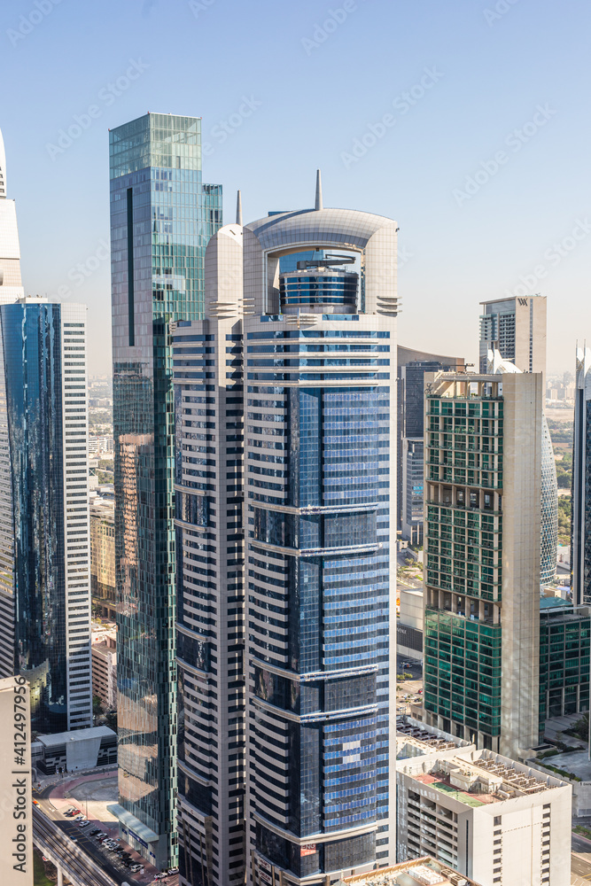 DUBAI, UAE - December, 2020: Dubai skyline with beautiful city close to it's busiest highway on traffic