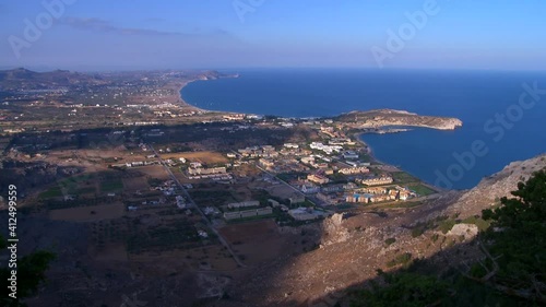 Rhodes Greece Kolimpia is located on the east side of the island is a popular touristic village with many resorts ,Time-Lapse of the shadow covering the land
 photo