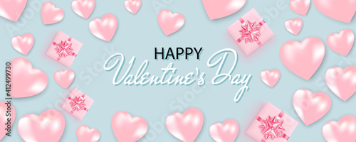 Happy Valentine's Day banner with pink hearts, gift box on blue background. Valentine's Day card.