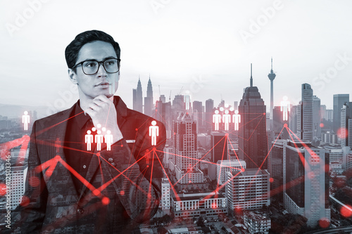 Photography Handsome eastern HR director at international company thinking about efficient strategy to recruit highly qualified specialists