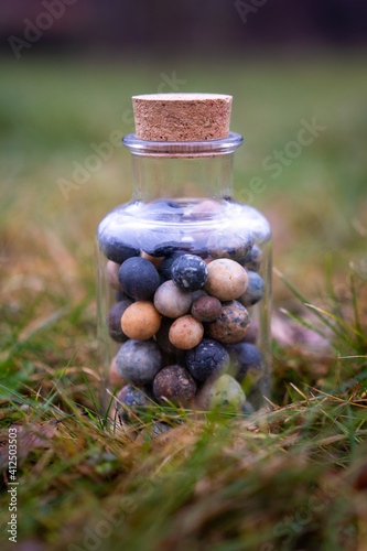 Little soap balls in the glass bottle
