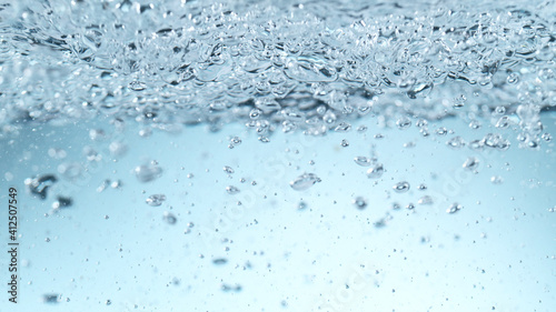 Detail of waving water with bubbles