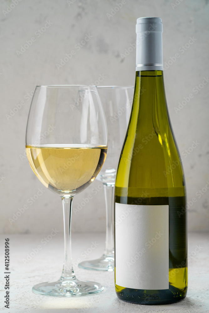 White Wine bottle with empty label and glasses, mockup logo design
