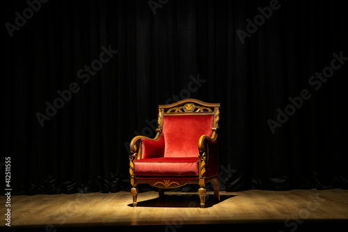Red wooden seat on the theater stage
