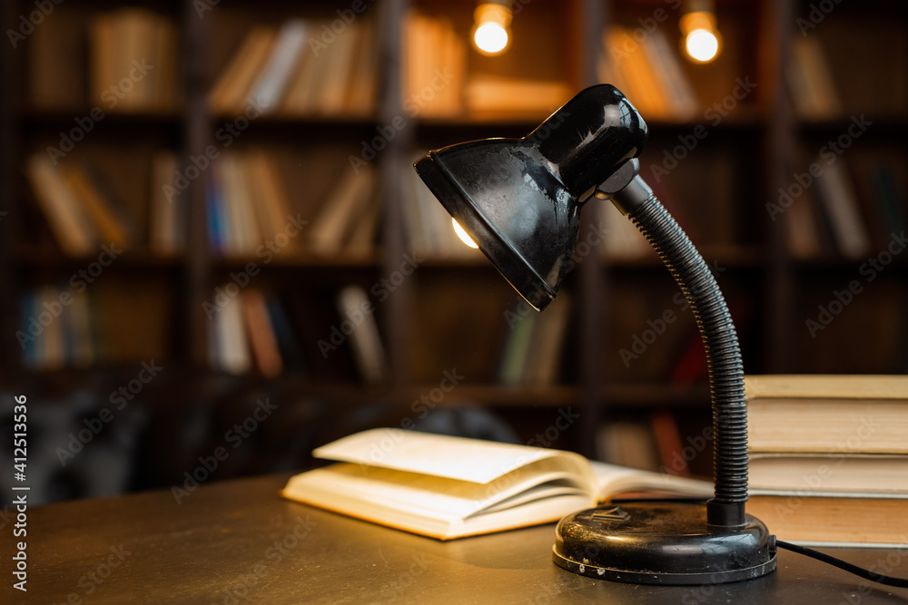 table lamp on the table with books table lamp on the table with books