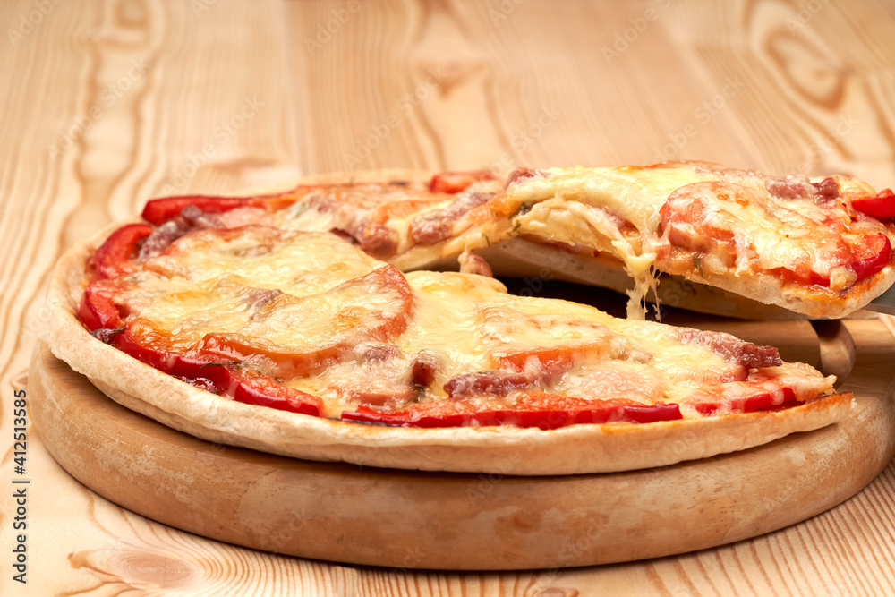Bright juicy tasty pizza. two floors. Lots of cheese and tomato. Side view. Bright juicy tasty pizza. two floors. Lots of cheese and tomato. Side view.