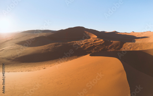 Sand dunes in the desert at sunrise in Namibia
