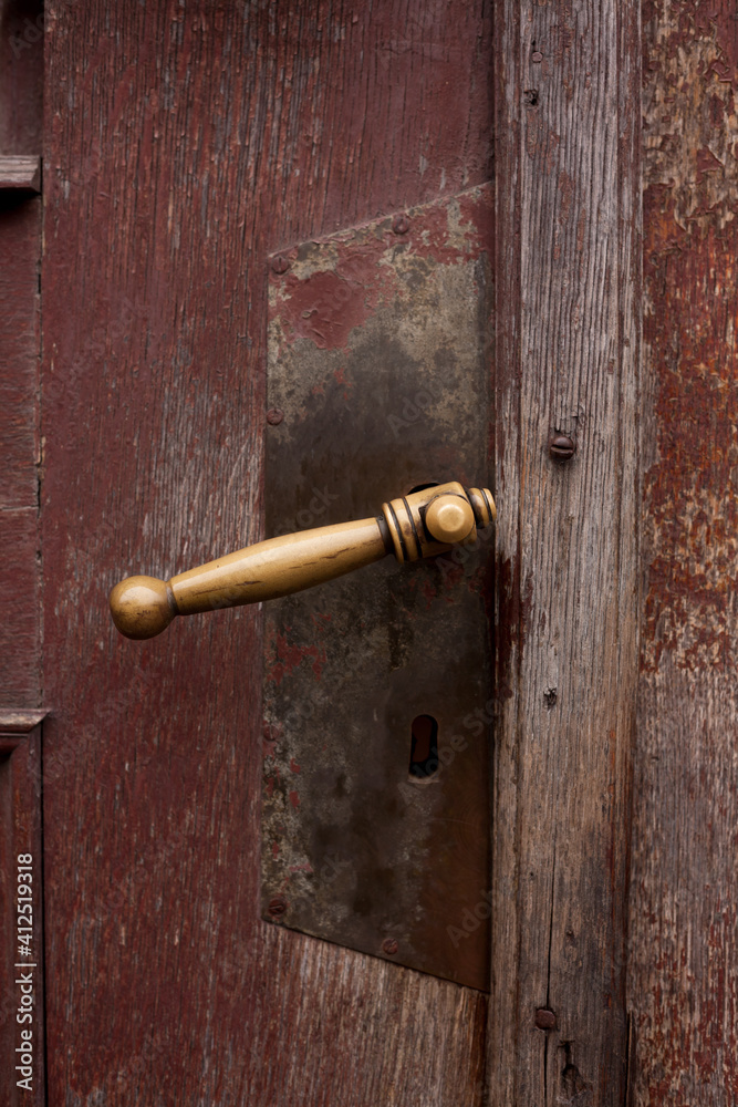 Antique door with a lock. Doorhandle. Antique door with a lock. Doorhandle.