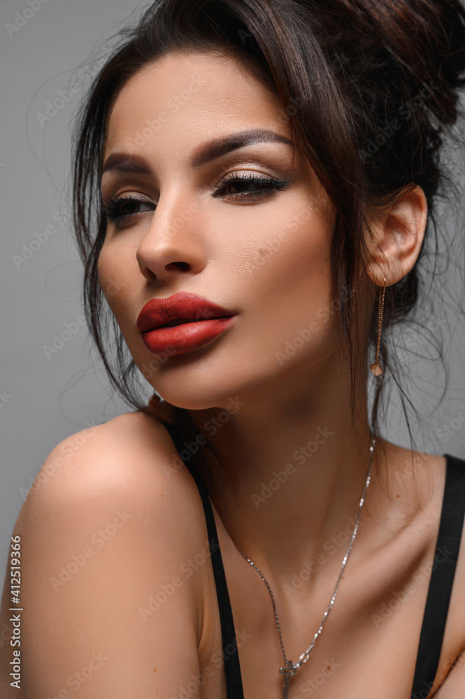 Attractive and sexy brunette with hairstyle and makeup Attractive and sexy brunette with hairstyle and makeup