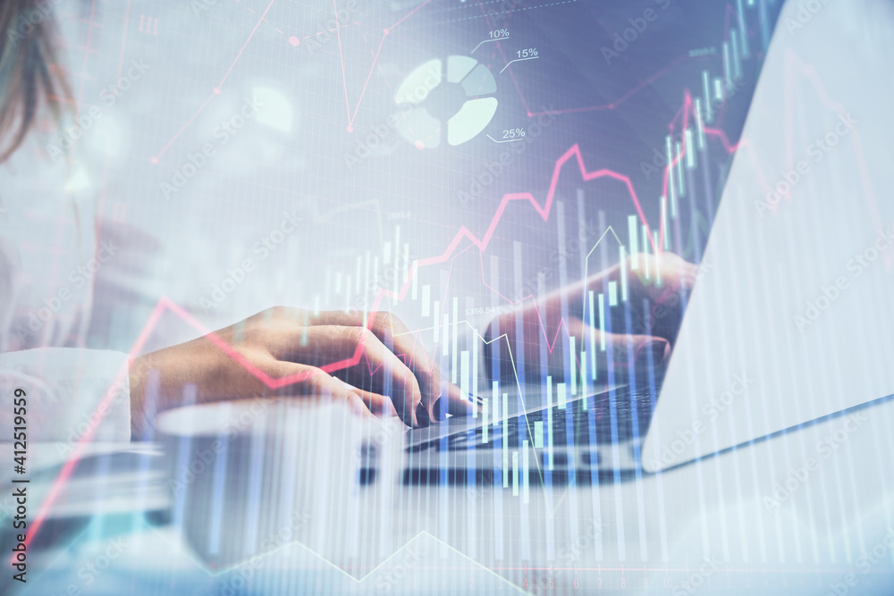 Double exposure of woman hands working on computer and forex graph hologram drawing. Financial analysis concept. Double exposure of woman hands working on computer and forex graph hologram drawing. Financial analysis concept.