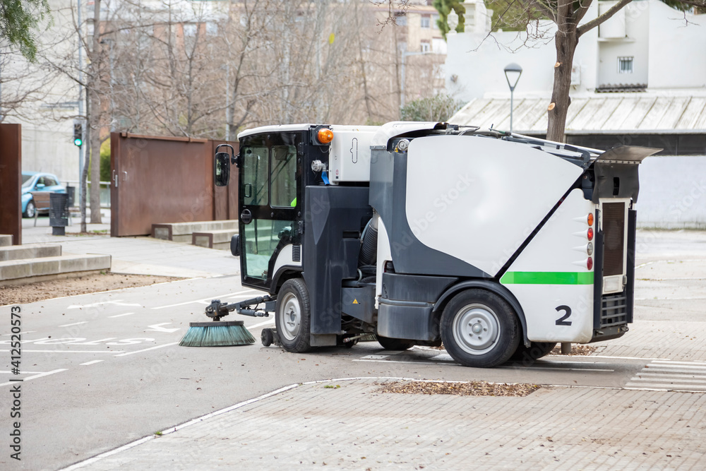 Municipal sweeping vehicle cleaning.