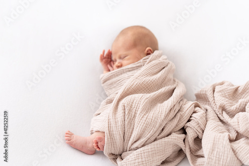 newborn baby sleeping indiaper