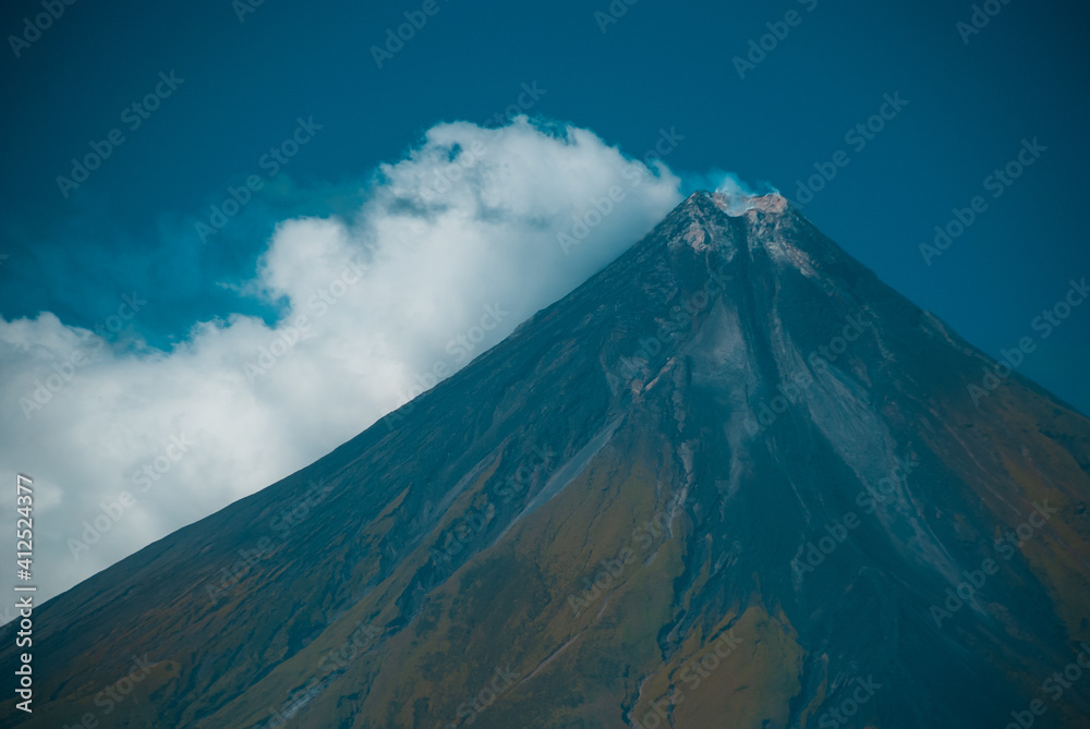 The famous perfect cone of Mt. Mayon under a blue clear sky in the Philippines