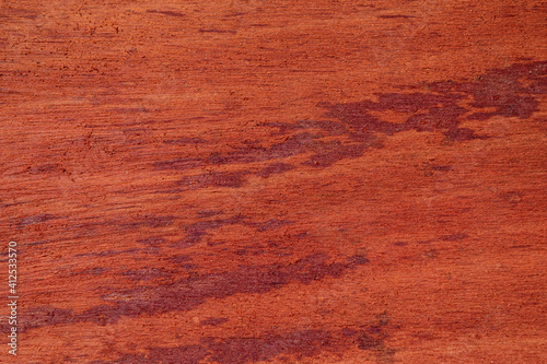 orange, brown, red and yellow wood planks with spots and texture