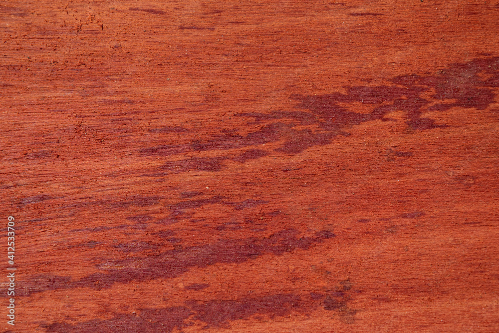 orange, brown, red and yellow wood planks with spots and texture