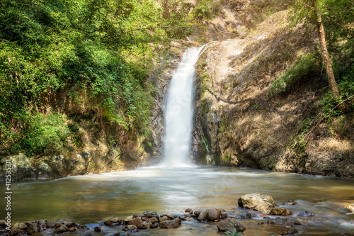 Beautiful waterfall in tropical forest in Chae Son National Park, Lampang, Thailand