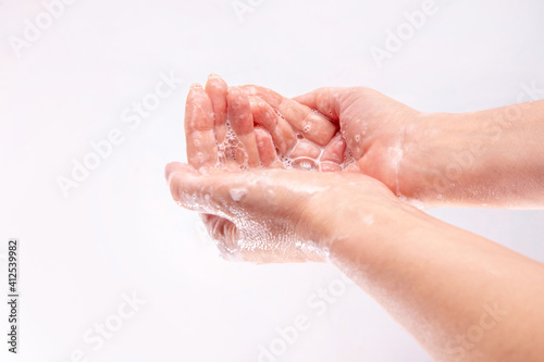 Washing hands rubbing with soap woman for coronavirus prevention. Hygiene to stop spreading coronavirus.