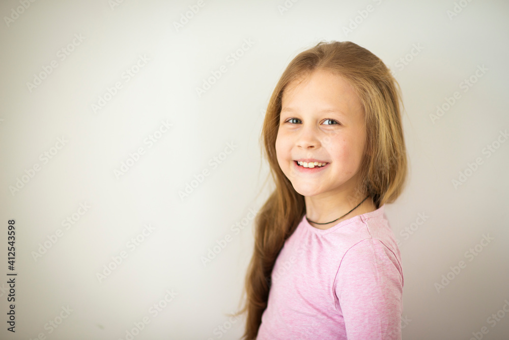 Emotional girl with blonde hair on a white background
Cute 8-10 year old girl in pink T-shirt Emotional girl with blonde hair on a white background
Cute 8-10 year old girl in pink T-shirt