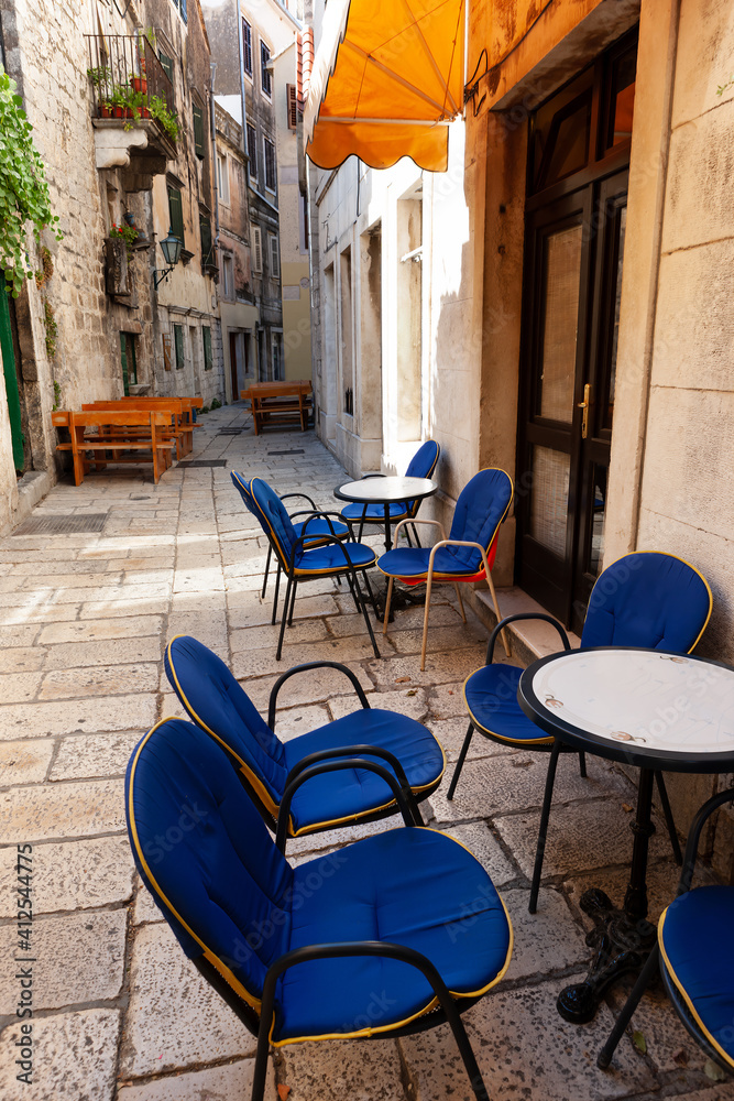 Street cafe on the narrow streets of the Mediterranean riviera