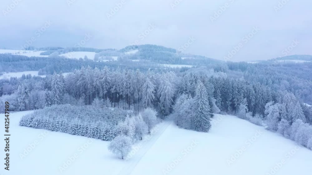 Winter forest from drone camera. Snowy mountains in Czech landscape. Winter forest from drone camera. Snowy mountains in Czech landscape.