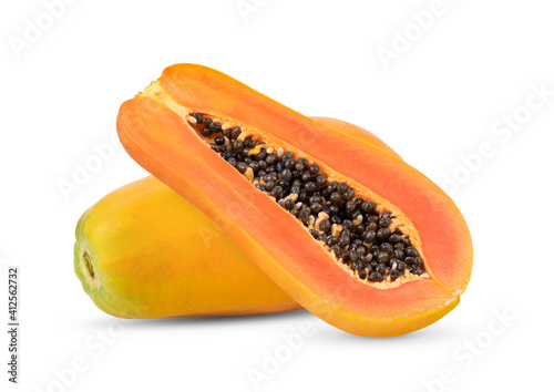 ripe papaya fruit with seeds on white background