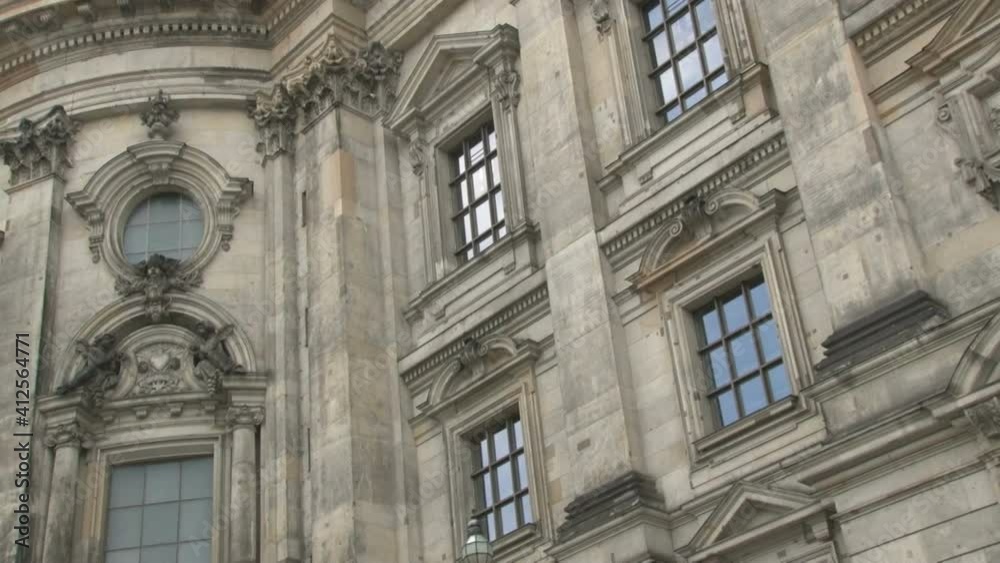 Crosses, statues and bas-reliefs on the building of the Berlin Cathedral on the Museum Island in Berlin Crosses, statues and bas-reliefs on the building of the Berlin Cathedral on the Museum Island in Berlin