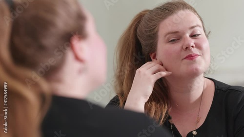 Wallpaper Mural [4k] young brunette chubby woman smiling at herself in the mirror Torontodigital.ca