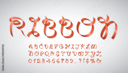 Red ribbon alphabet of paper folding.