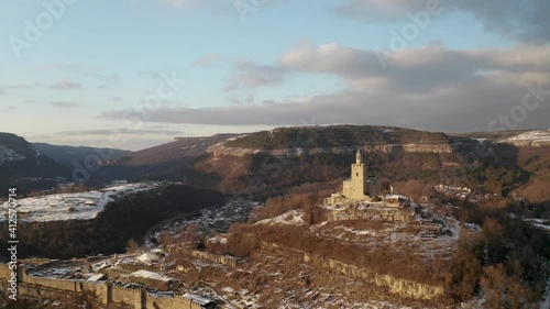 Aerial video around Tsarevets Hill with the Patriarchal Church and part of Veliko Tarnovo town with Yantra river, Bulgaria photo