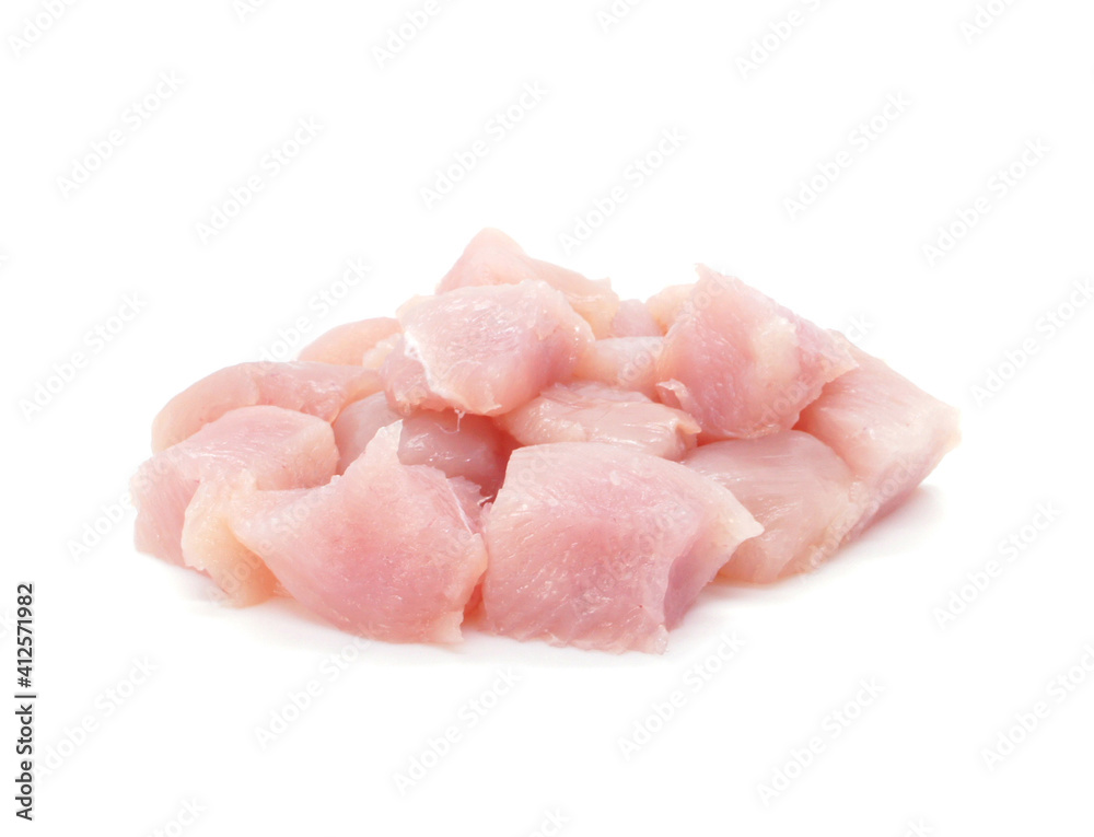 Pieces of chicken fillets isolated on white background. Small pieces of raw meat. Pieces of chicken fillets isolated on white background. Small pieces of raw meat.