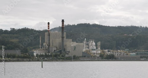 View of ENCE paper mill factory on Ria de Pontevedra, Galicia Spain. Timelapse photo