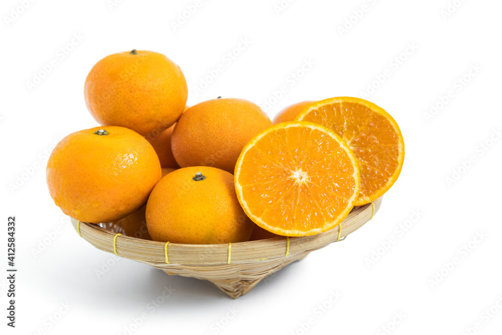 Orange slice and orange group in basket isolated on white background Orange slice and orange group in basket isolated on white background