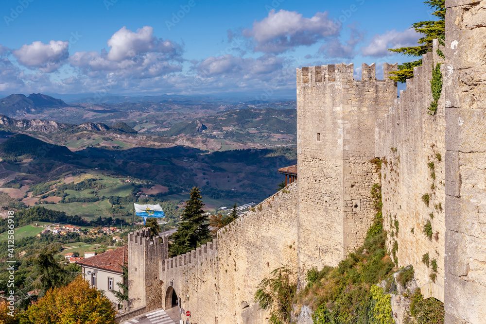 A glimpse of the ancient walls of the fortified city of San Marino in the homonymous Republic