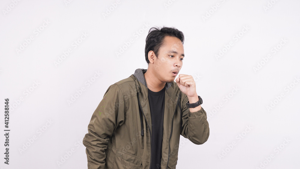 Asian man is suffering with cough isolated white background Asian man is suffering with cough isolated white background