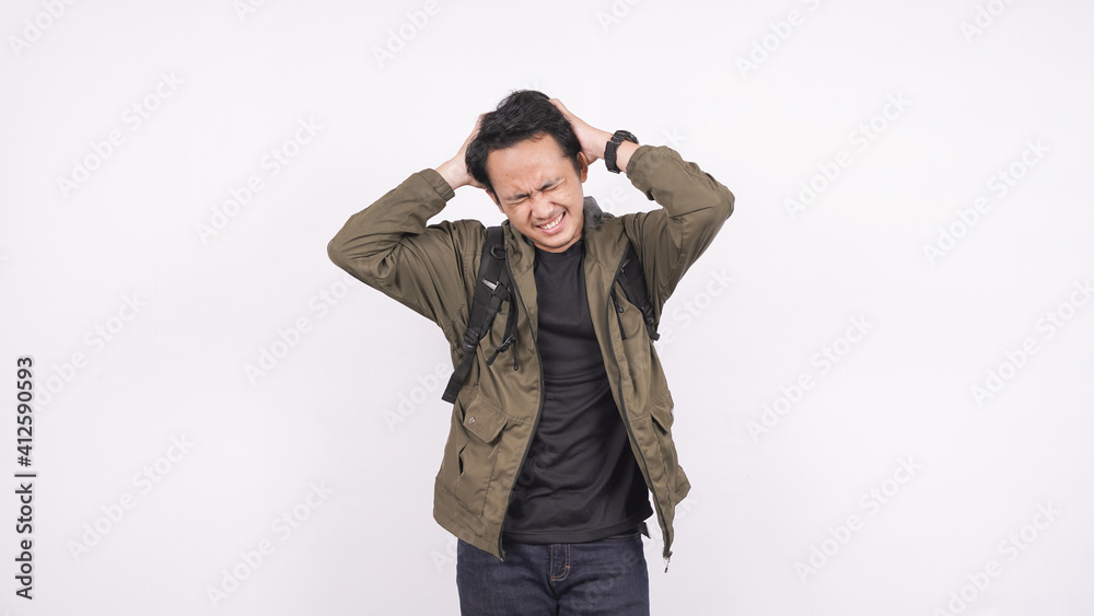Asian man wearing bag confused and frustased white background Asian man wearing bag confused and frustased white background