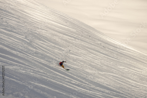 Freeride in fresh powder snow in alps. Swiss alps in Jungfrauregion in Switzerland