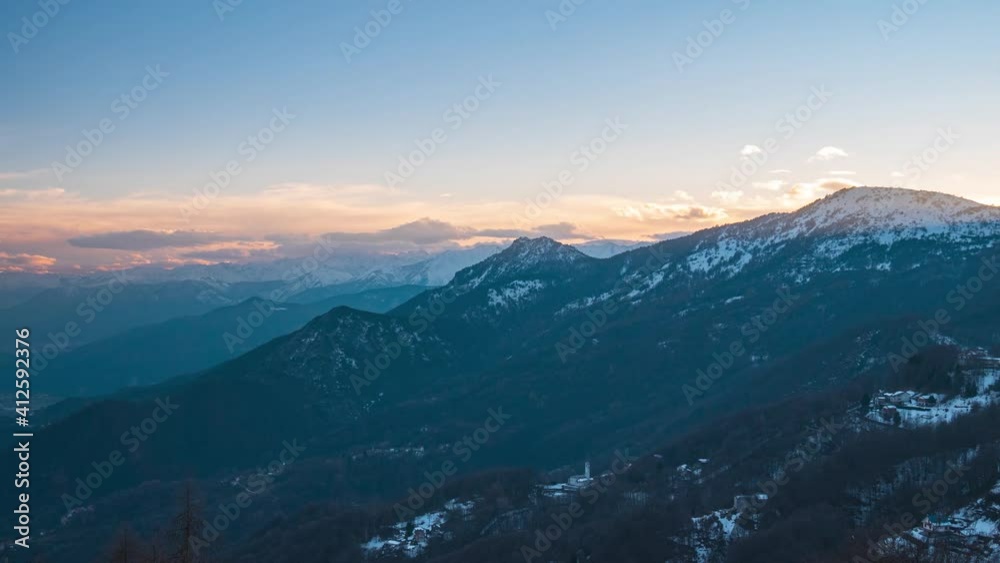 Time lapse: sunset over the Alps, unique scenery panoramic view alpine valley moving clouds, winter season. Time lapse: sunset over the Alps, unique scenery panoramic view alpine valley moving clouds, winter season.