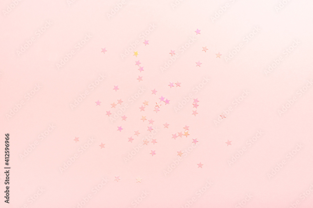 Delicate pink background with stars. The concept of femininity, fragility, women's day, the Day of St. Valentine, Christmas, New Year, holiday, birthday, etc.