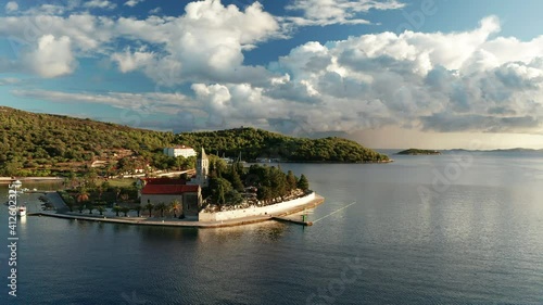 Aerial view of Vis town at sunset on Vis island, Croatia. Crkva sv. Jeronima photo