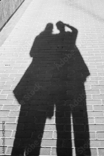 shadow of a young couple