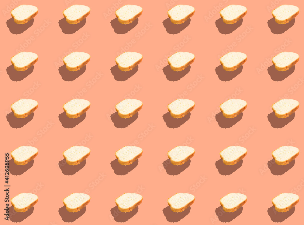 Pattern with slices of sliced white bread with a shadow. The levitation effect. Pattern with slices of sliced white bread with a shadow. The levitation effect.