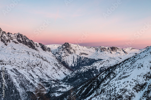 Pink sunset on the mountains of the Chamonix Valley, French Alps, France