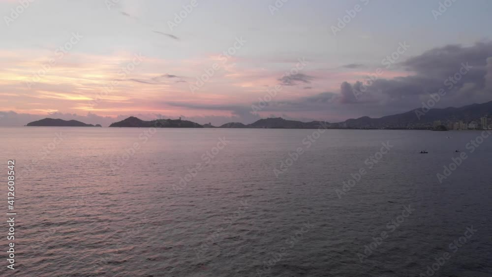 Beautiful view of the beach, aerial view of the beach, acapulco beach seen from above. Travel and vacation concept. Colorful sunset on the beach. Aerial video Beautiful view of the beach, aerial view of the beach, acapulco beach seen from above. Travel and vacation concept. Colorful sunset on the beach. Aerial video