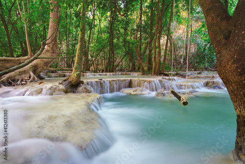 wooden swing in Wang Kan Luang Waterfall for relaxation natural therapy  Lopburi province Thailand