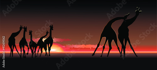 Africa. Giraffes run against the sunset. Can be used as an illustration and as a background