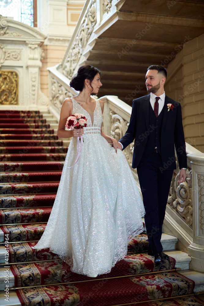 Fototapeta premium bride and groom in wedding dress