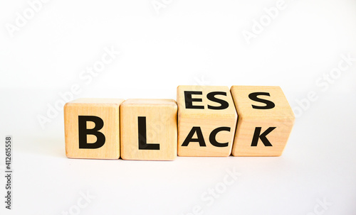 Bless black symbol. Turned a cube and changed the word 'black' to 'bless'. Beautiful white background. Bless black concept. Copy space.